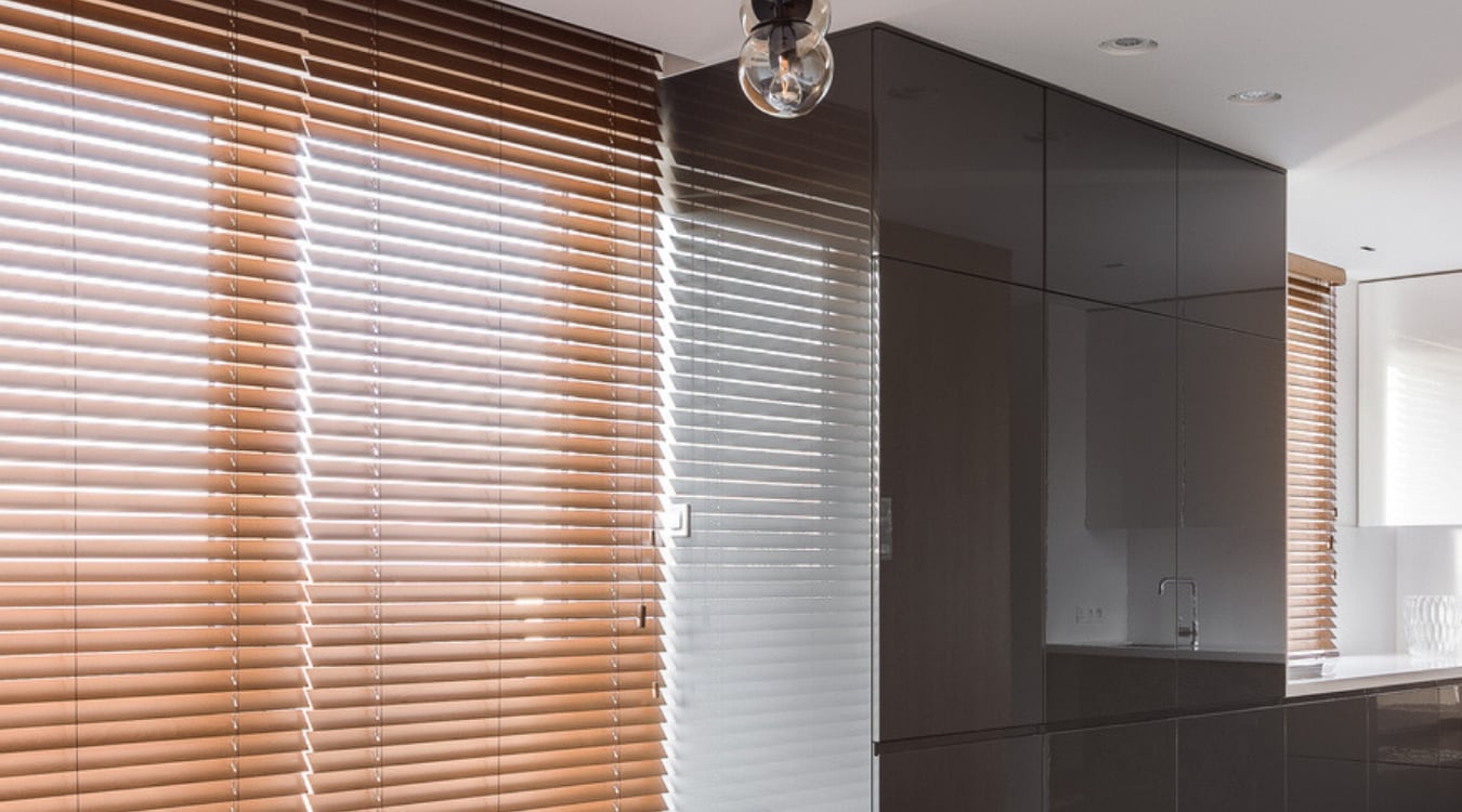 Warm wooden blinds in a window